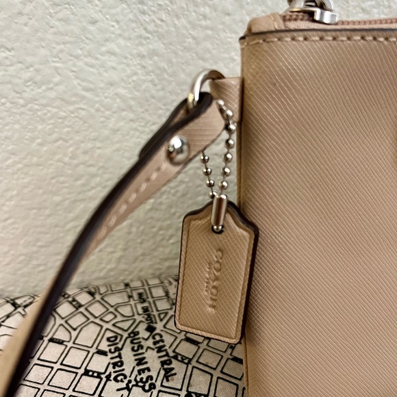 Coach Wristlet with bow Color: Sand/tan 6.25"W x 4.25"H x .25 D - Picture 5 of 6